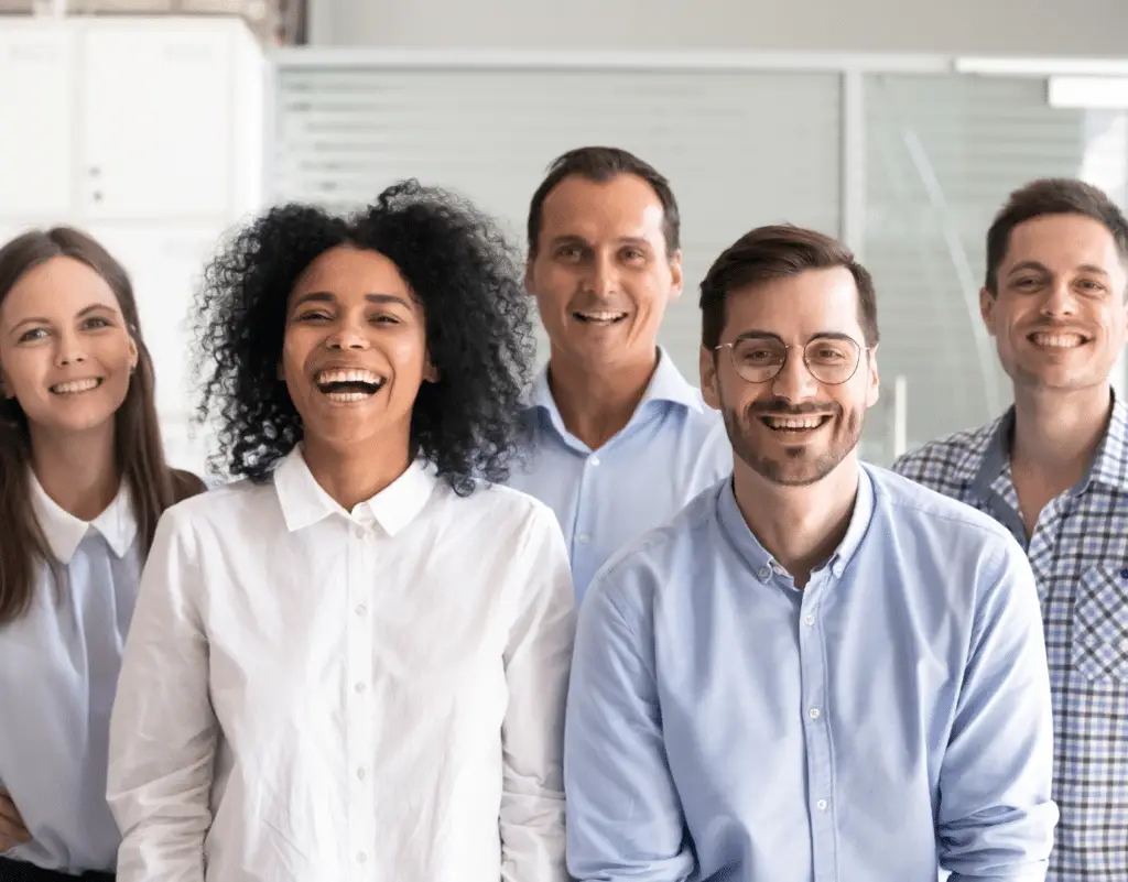 Employees laughing at work